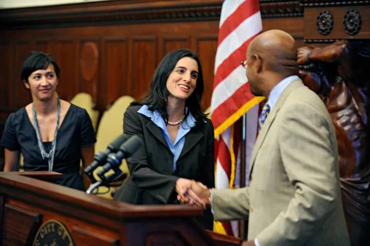 Rebecca Rhynhart, shaking Mayor Nutter's hand, served as his city treasurer and budget director.