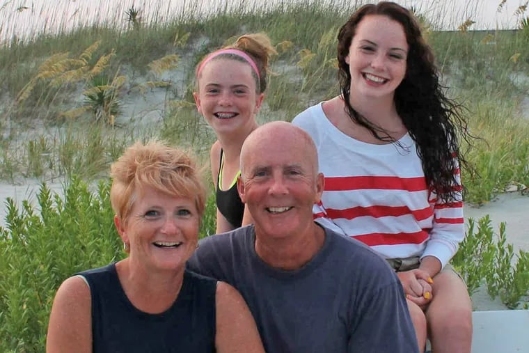 Steve Kelly with his family , of whom he spoke with pride: Wife Kerry (front) and daughters Kacey (left) and Delaney.