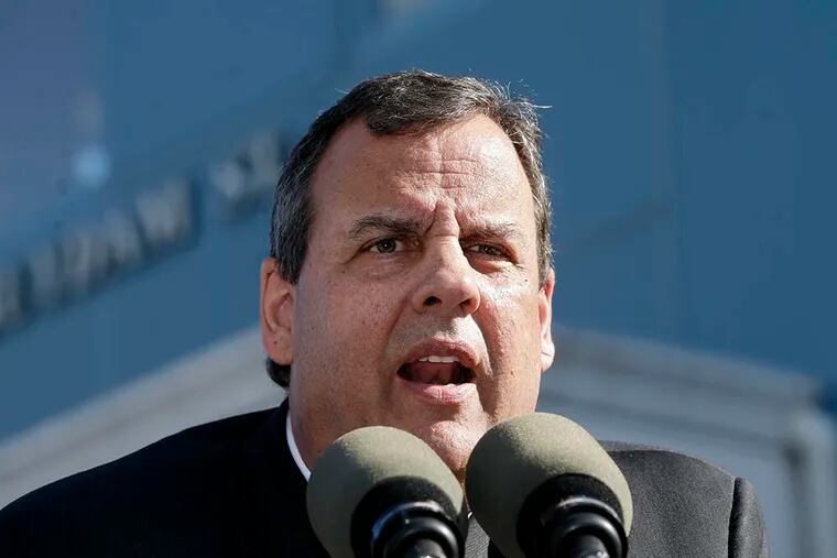 Gov. Christie, in New Brunswick to sign two drug-abuse bills, addresses a news conference. He said reports of a plea in the George Washington Bridge lane closures would not involve him, and defended the sending of state troopers to Baltimore. (MEL EVANS / Associated Press)