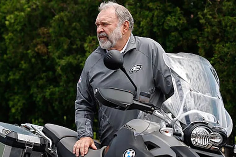 Riding motorcycles is an escape for Eagles offensive line coach Howard Mudd. (David Maialetti/Staff Photographer)