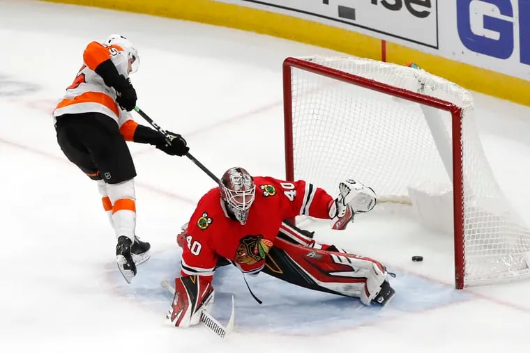 Flyers left winger James van Riemsdyk beats Chicago Blackhawks goaltender Robin Lehner for his first goal of the season Thursday, securing a 4-1 win.