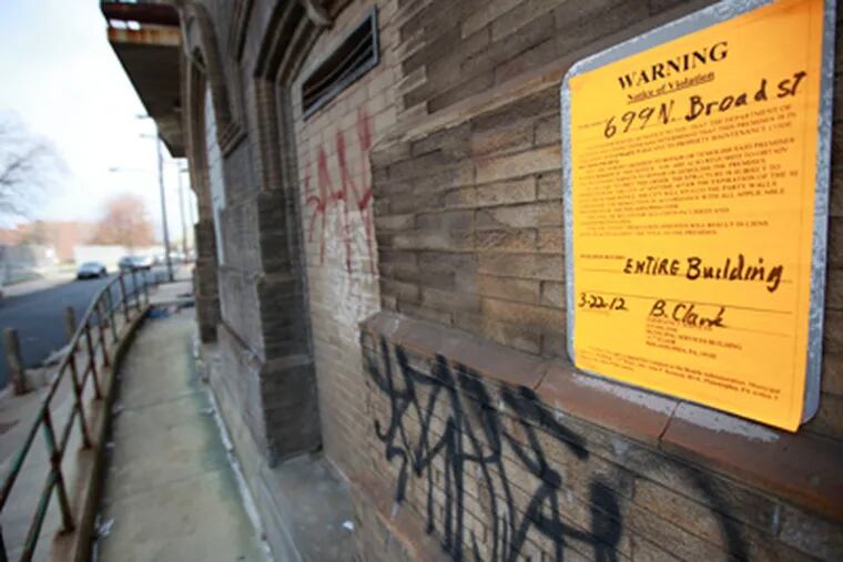 The 'repair or demolish' order posted at the historic hotel is meant to keep the building secure, Deputy Mayor Alan Greenberger said. The city is working to find a new owner for the North Broad Street landmark. DAVID SWANSON / Staff Photographer