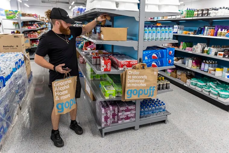 A Gopuff worker putting together a customers order at the new delivery center in Philadelphia, Pa., Tuesday, Sept., 20, 2022.