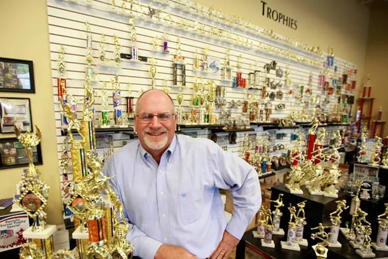 Keith Baldwin is the president of Spike's Trophies.(DAVID SWANSON / Staff Photographer)