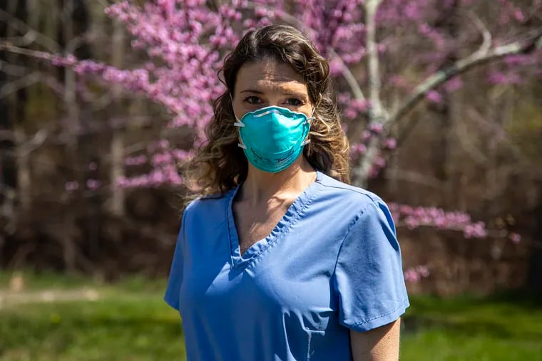 Dawn Kulach of Sicklerville, a registered nurse, wearing an N95 mask last year. High-grade masks can filter out some, but not all pollen.