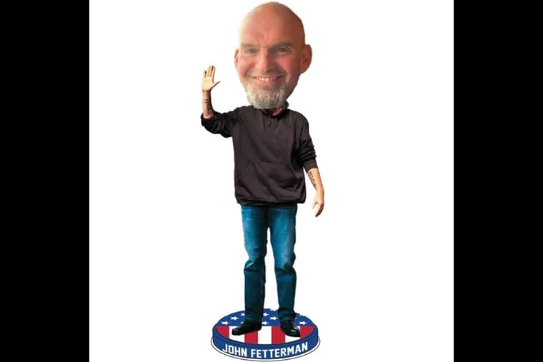 U.S. Sen. John Fetterman is getting the bobblehead treatment. As this rendering shows, Fetterman gives politician-off-duty vibes with a black hoodie, blue jeans, and a sliver of arm tattoos.