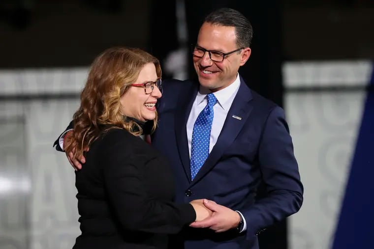 Josh Shapiro hugs his wife, Lori Shapiro, after his speech at the Greater Philadelphia Expo Center in Oaks, Pa. on Tuesday, Nov. 8, 2022. Shapiro won the Pa. governor race, according to the AP.