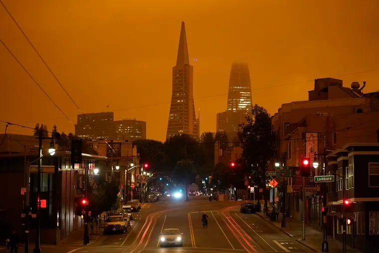 San Francisco's Transamerica Pyramid and Salesforce Tower were covered with smoke from wildfires late Wednesday morning.