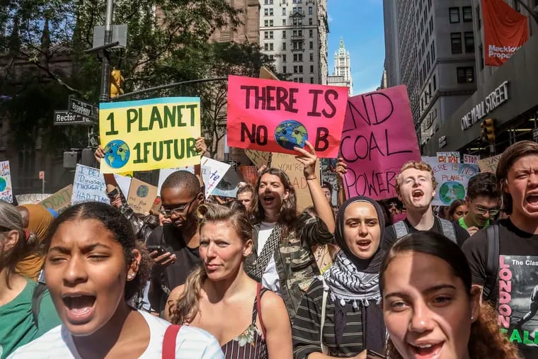 In this Sept. 20, 2019 file photo, climate change activists participate in an environmental demonstration as part of a global youth-led day of action in New York, as a wave of climate change protests swept across the globe.