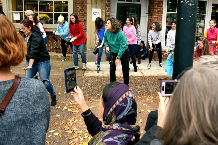 A flash mob dances in downtown Haddonfield Sunday marking Diwali, the Hindu Festival of Lights. The holiday, also known as Deepavali, is one of the most important festivals in Hinduism.