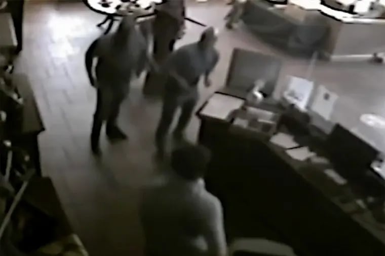 A screen grab of surveillance video of a fight inside the Shannondell Golf Pro Shop. State Sen. Anthony Williams Jr.'s aide, who is also his cousin, has been charged with assault for a fight inside the golf shop in Montgomery County in November 2020.