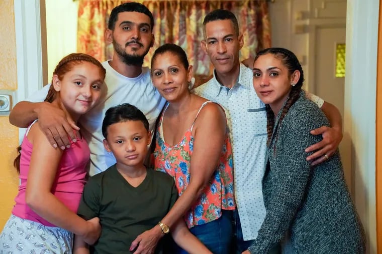 (Clockwise from far left) Mia Sanchez, Angel Neco, Jacqueline Perez, Angel Gonzalez, Nitza Janet Neco, and Angel Neco Jr., shown here at their home, in Philadelphia, Thursday, July 26, 2018. JESSICA GRIFFIN / Staff Photographer.