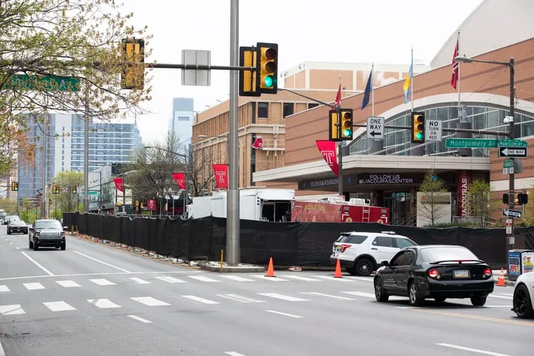 The southbound portion of Broad Street is shut down between Montgomery Avenue and Cecil B. Moore Avenue in front of the Liacouras Center at Temple University. The Center is accepting coronavirus patients as a field hospital, while the university is closed to students due to the pandemic.