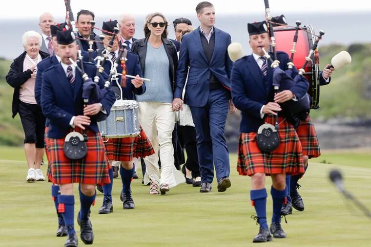 Eric Trump, son of President Trump and executive vice president of Trump Organization, and his wife Lara Yunaska Trump, attend the grand opening of The King Robert The Bruce Golf Course at Trump Turnberry golf resort, owned by The Trump Organisation Inc., in Turnberry, Scotland, on June 28, 2017.