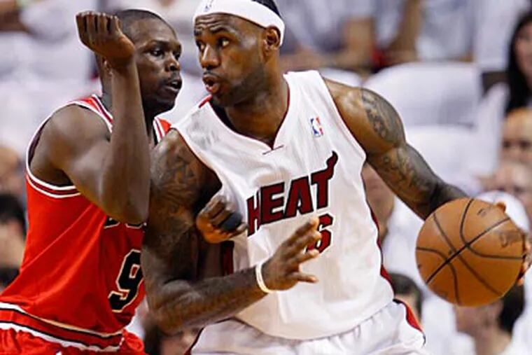LeBron James and the Miami Heat will face the Dallas Mavericks in the NBA Finals. (Wilfredo Lee/AP)
