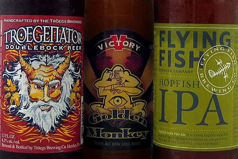 Three Great American Beer Festival gold-medal-winning beers from area brewers are (from left) Troegs Troegenator Double Bock, Victory Golden Monkey and Flying Fish HopFish.