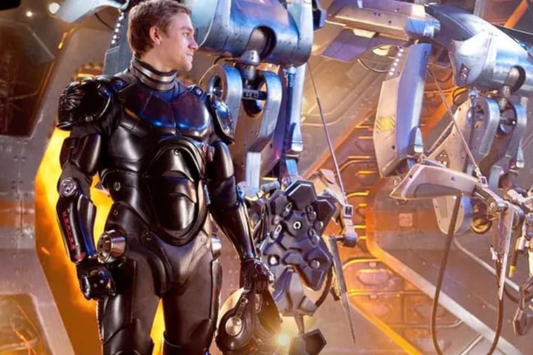 Charlie Hunnam and Rinko Kikuchi are robot pilots charged with saving Earth from super demons.
