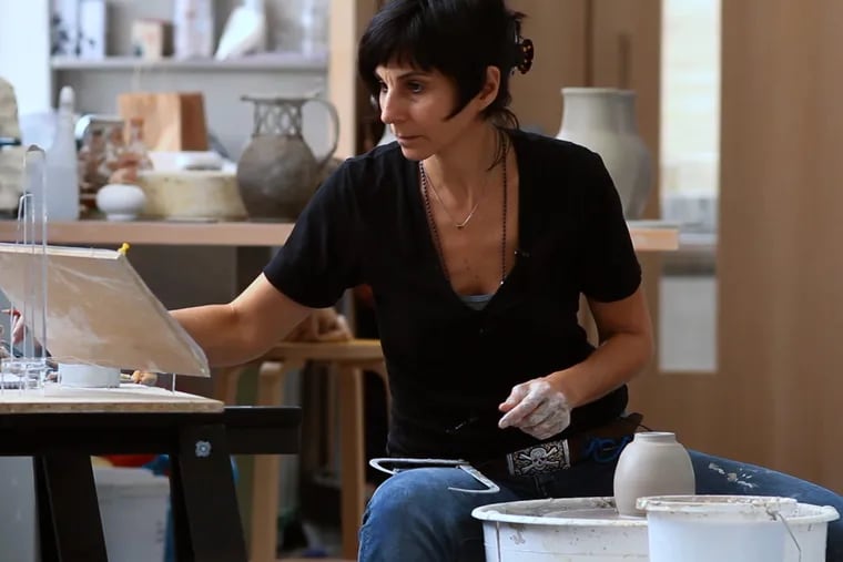 Michelle Erickson in her studio. Erickson specializes in ceramics from the colonial era.