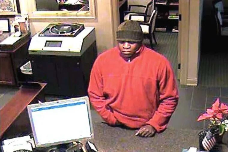 A bank camera captured the image of a suspected bank robber.