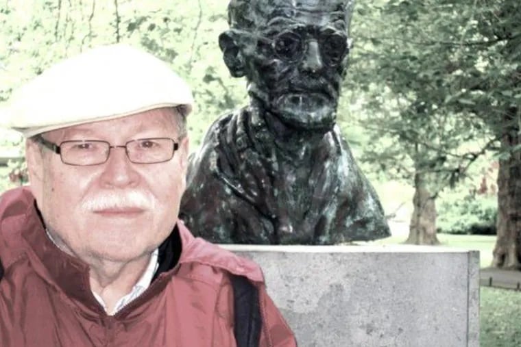 Dr. Grady stands near a statue of Irish writer James Joyce during a visit to Dublin.