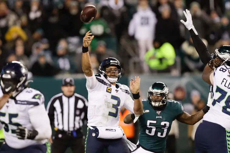 Seahawks quarterback Russell Wilson throws the football against the Eagles late in the fourth-quarter.