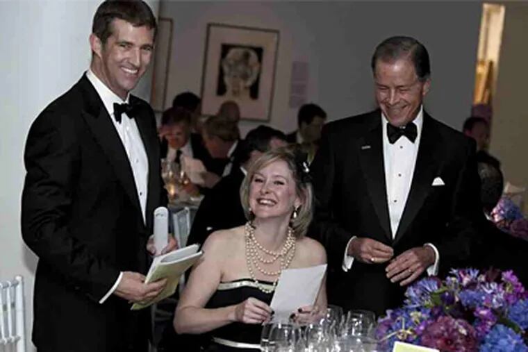 Jonathan Hochman (left), Veronica McKee, and Chuck Homer were among guests at the Bacchanal Wine Gala and Auction. (Photo / David Hershey)