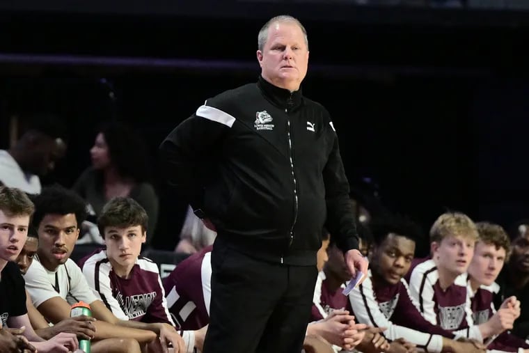 Lower Merion coach Gregg Downer directs his team during the District 1 Class 6A championship at the Liacouras Center on Saturday.