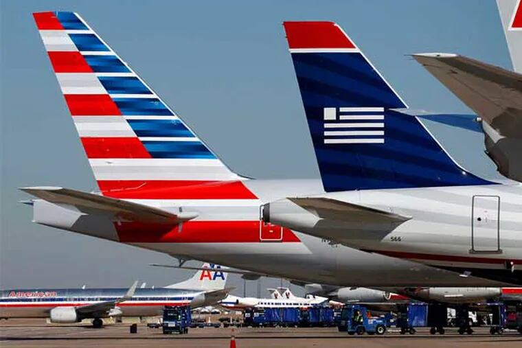 US Airways and American want to tie the knot. (Tom Fox / Dallas Morning News)
