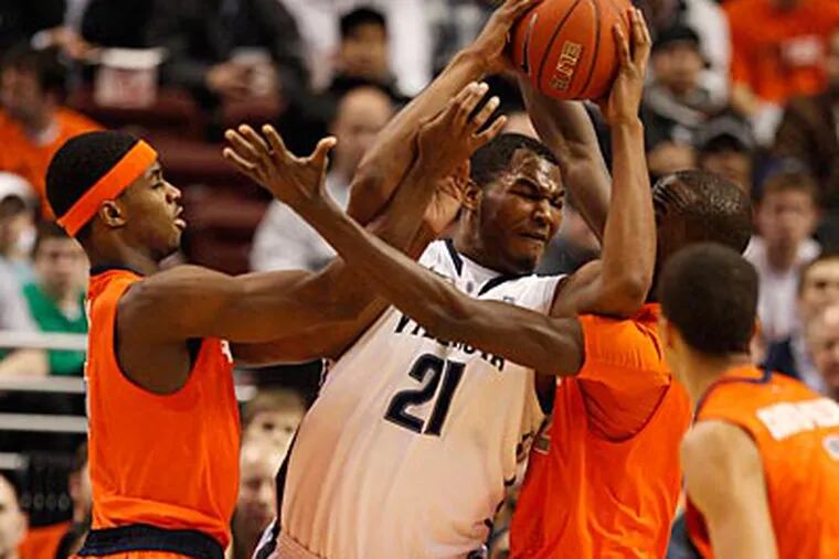 Villanova's Markus Kennedy gets surrounded by Syracuse players on Wednesday night. (Ron Cortes/Staff Photographer)