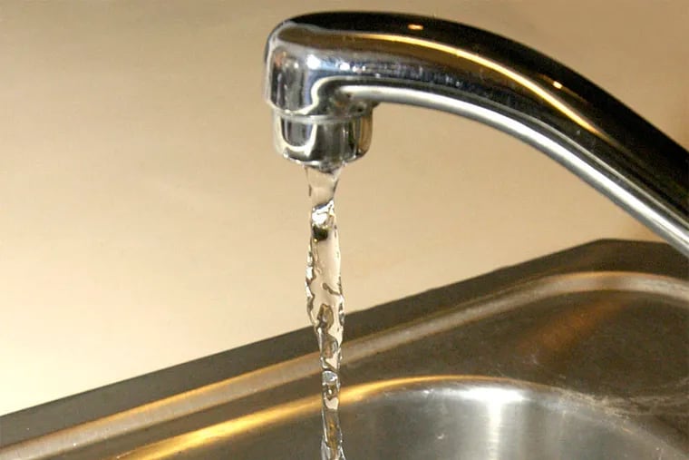 Faucet emitting water
