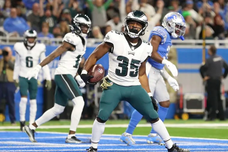Eagles running back Boston Scott scores a first quarter touchdown against the Detroit Lions on Sunday, October 31, 2021 in Detroit.