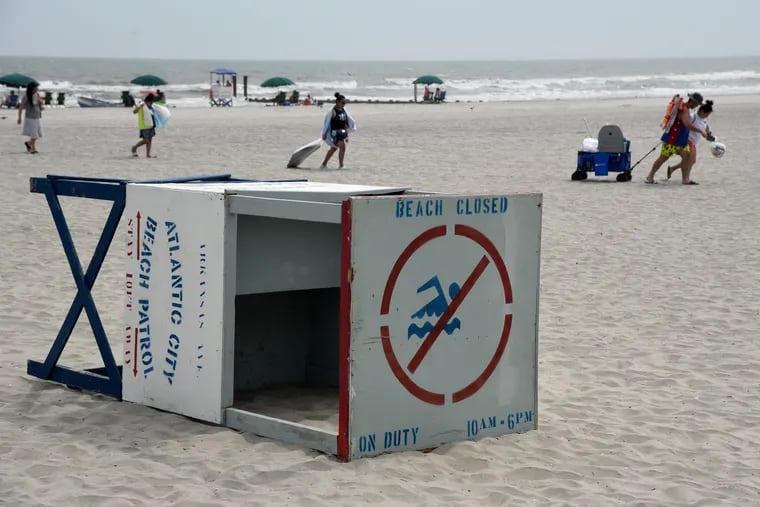 Beach Patrol stands have been dragged up to higher ground by life guards on the beach in Atlantic City Thursday, hours before the arrival of Tropical Storm Elsa.