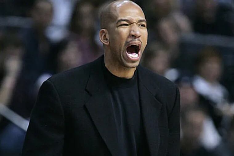 Monty Williams played in 21 games with the Sixers in 2002-03. (Duane Burleson/AP file photo)
