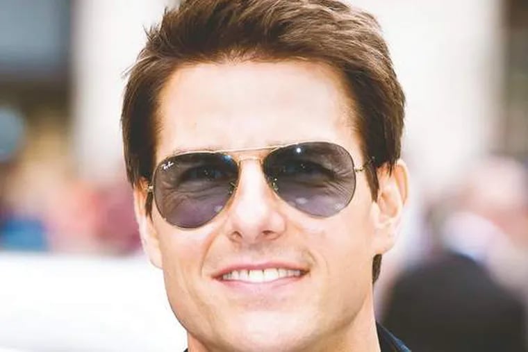 Tom Cruise arrives for the European Premiere of Rock of Ages, at a central London cinema. Sunday, 

Photos: Associated Press