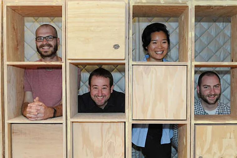 Justin Bernard (left), of the University of the Arts, with (from left) Christopher Renn,  Judy Chang and Bryan Sistino of Bohlin Cywinski Jackson.   ( CLEM MURRAY / Staff Photographer )
