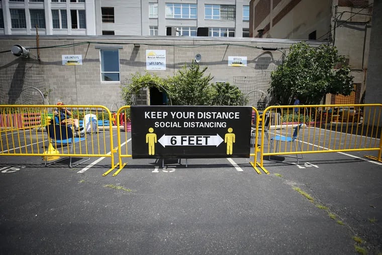 A recently created outdoor space is in the parking lot at Sunday Breakfast Rescue Mission in Philadelphia, Pa. on June 23, 2020. The coronavirus may become a yearly risk.