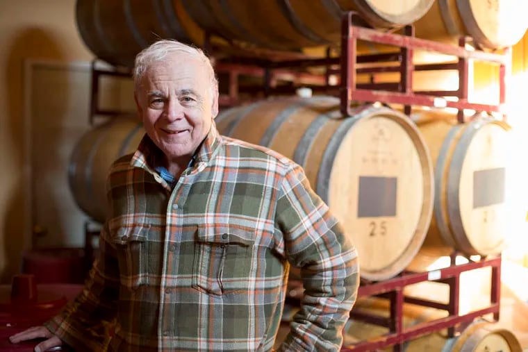 Alfred Natali, owner of Natali Vinyards, stands in his winery with barrels that will be used for new course filtered red wines this season, November 23, 2016. Tourists are visiting South Jersey for its open-to-the-public agriculture such as wineries, distilleries, and farms.