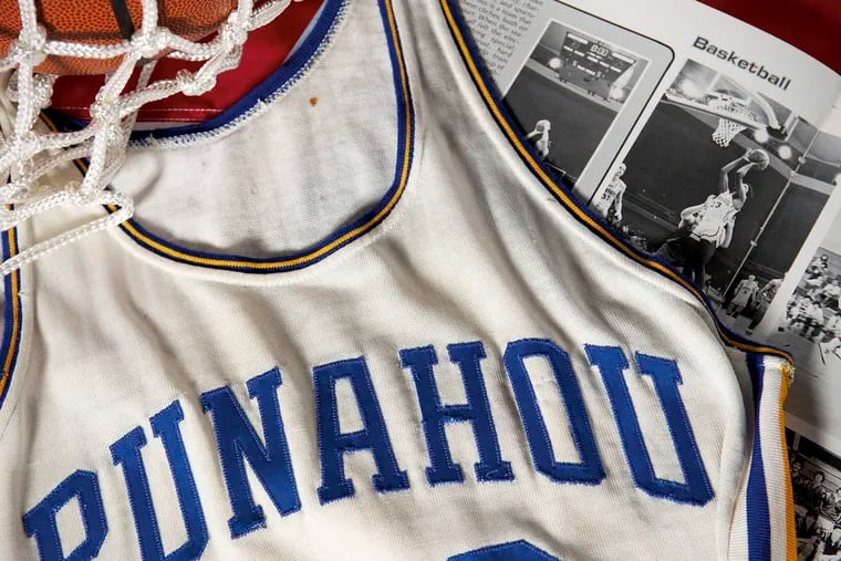 This undated photo released by Heritage Auctions shows a Punahou High School basketball jersey worn by former student Barack Obama. Bidding was drawing to a close Friday, Aug. 16, 2019, for the basketball No. 23 Punahou School jersey believed to have been worn by President Barack Obama. Obama the wore that number during the 1978-79 school year in Honolulu. (Heritage Auctions via AP)