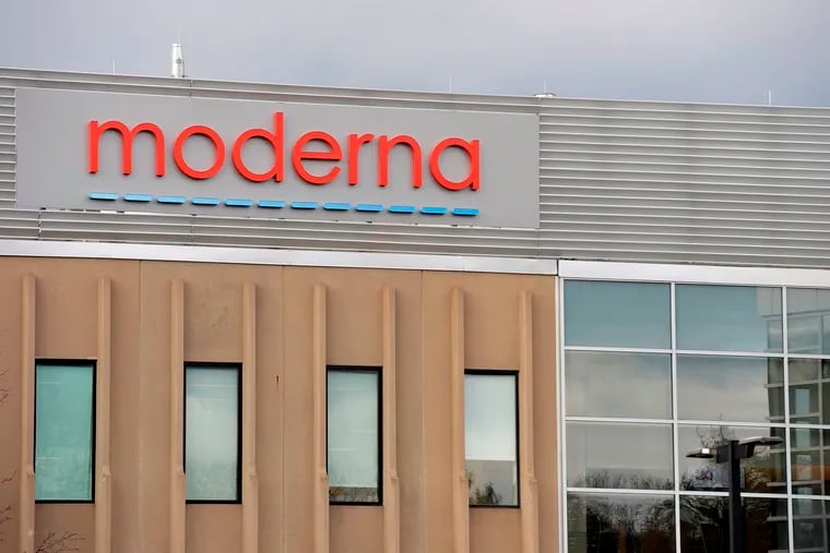 The Moderna logo is seen at the Moderna campus in Norwood, Mass.
