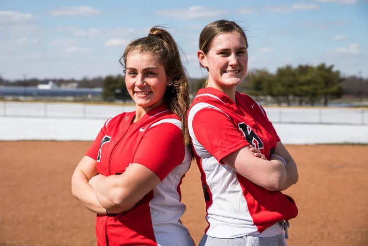 Danielle Dominik (left) and Grace Fagan are softball teammates and friends at Kingsway.