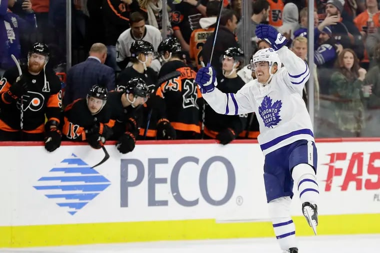 Toronto Maple Leafs left wing Andreas Johnsson celebrates his game-winning shoot-out goal against the Flyers.