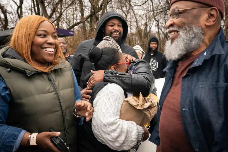 (Left to Right) Rasheedah Franklin, daughter, Steve Crawford, grandson, Gina Gibson, front center, daughter, Lisa Justice, back center, daughter, and William Franklin, father, the family celebrates as William Franklin is released from prison, in Philadelphia, Tuesday, March 5, 2024.
