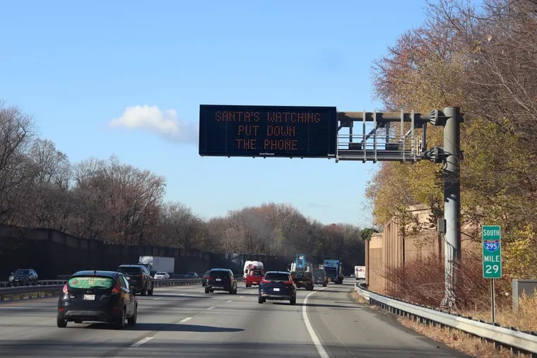 The New Jersey Department of Transportation is displaying creative holiday-themed safety signs on highways through the season.
