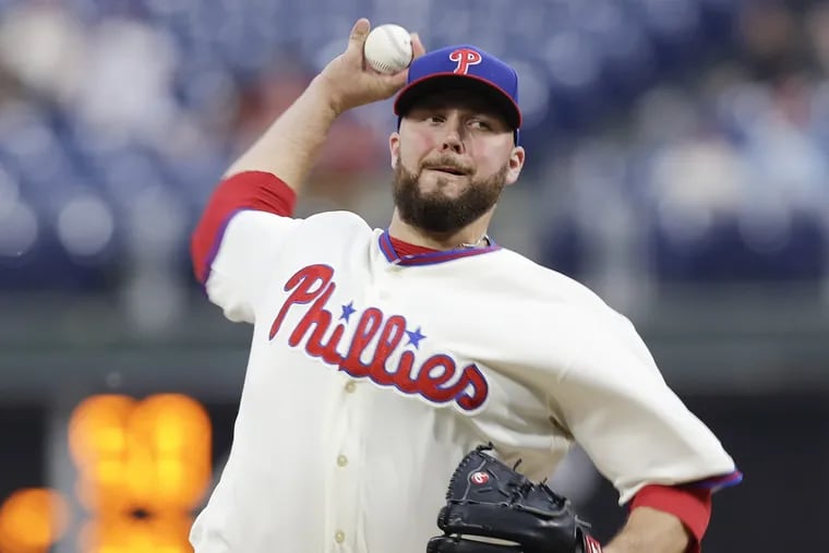 Phillies reliever Tommy Hunter faced one batter and threw two pitches, but picked up the save in Sunday's win over Milwaukee.