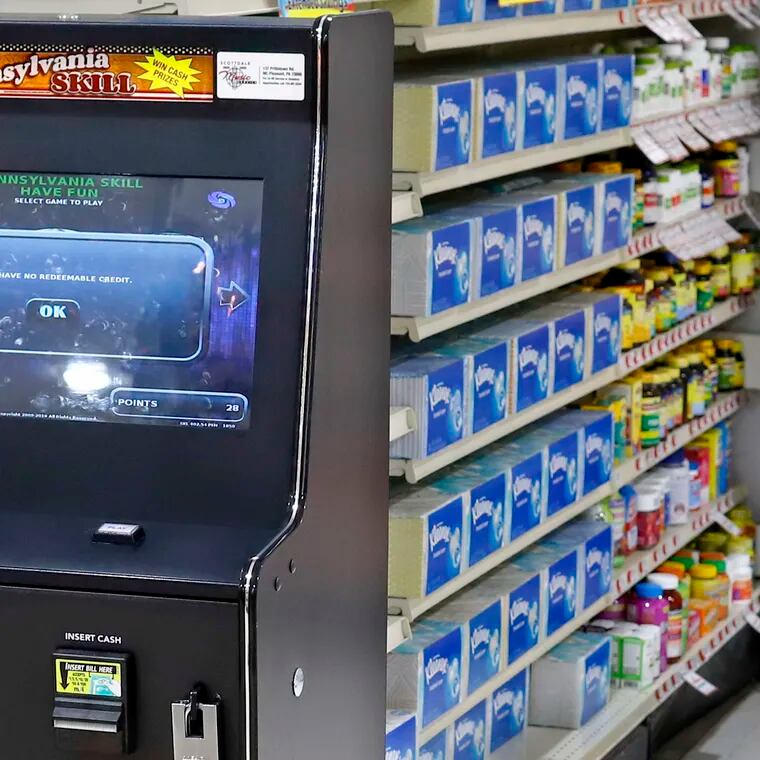 A Pennsylvania Skill brand game terminal, left, is available to play at a grocery store in Harmony, Pa.