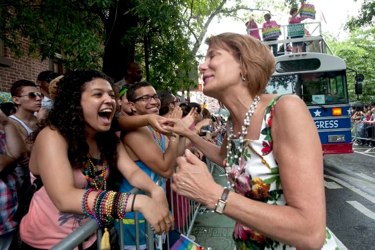 State Sen. Barbara Buono , shaking hands at a gay-pride parade in New York, says Christie is forsaking the majority views of New Jerseyans to play to a national conservative audience.