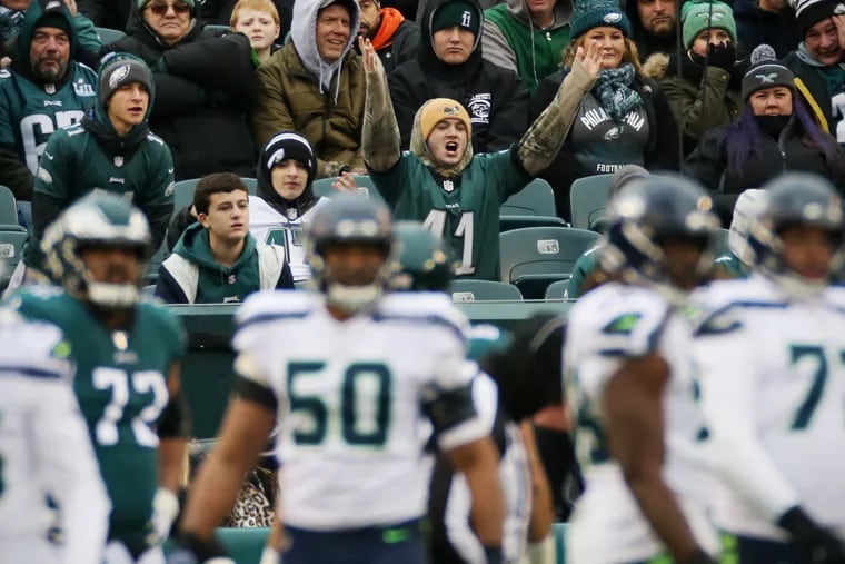 An Eagles fan reacts after quarterback Carson Wentz was sacked in the second quarter of the team's 17-3 loss to the Seattle Seahawks on Sunday.