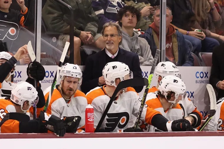 Head coach John Tortorella of the Philadelphia Flyers watches from the bench earlier this season