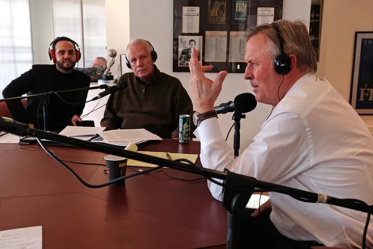 Audio producer Juan Torres-Falcon, left, Albemarle County, Virginia, Sheriff Chip Harding and author John Grisham record a podcast in Grisham's Charlottesville, Virginia, office in January 2019. (Norm Shafer/The Washington Post)