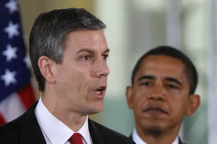 President-elect Barack Obama listens to his education secretary-designate, Arne Duncan. &quot;When it comes to school reform, Arne is the most hands-on of hands-on practitioners,&quot; Obama said.